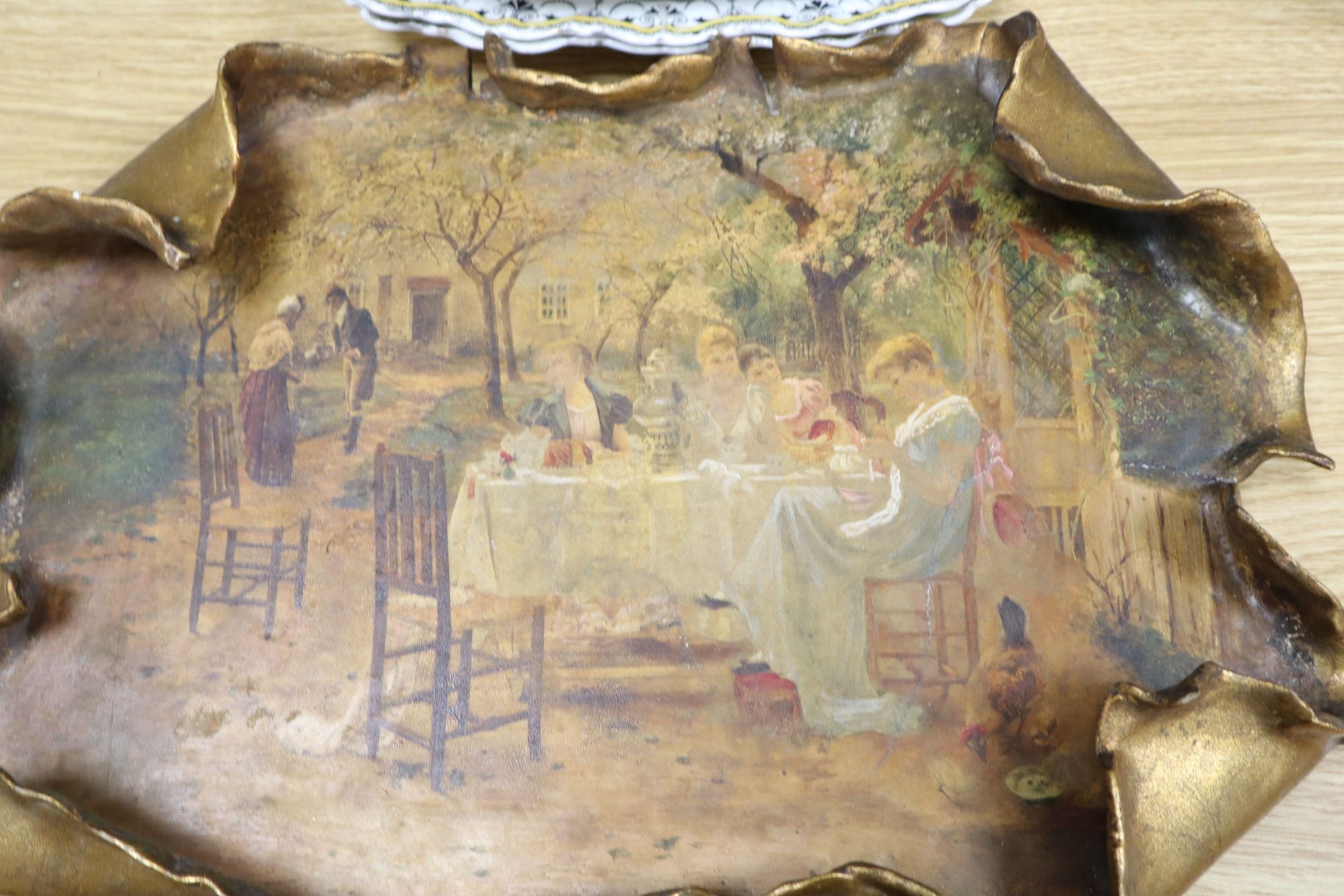 A gilt painted pottery plaque and mixed ceramics